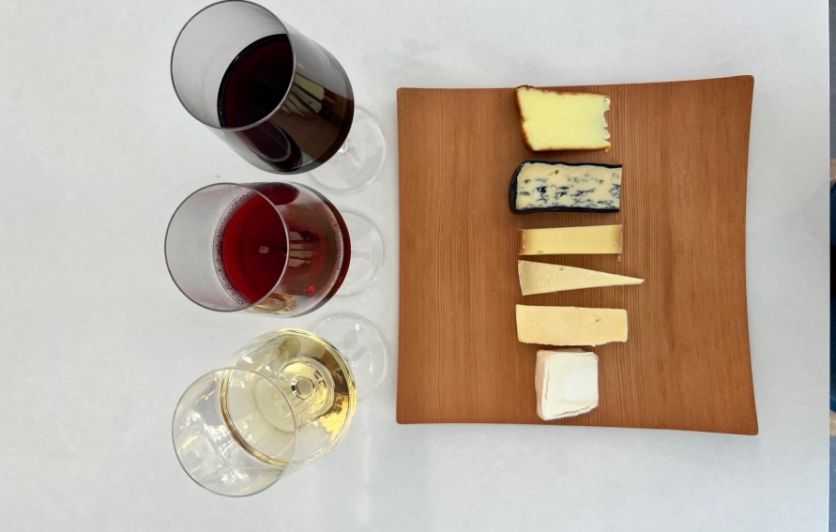 glasses of wine and cheese platter