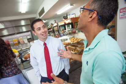 Mayor Diossa with La Sorpresa Bakery co-owner Hernan Florez