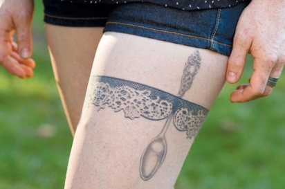 tattoo of a spoon on leg