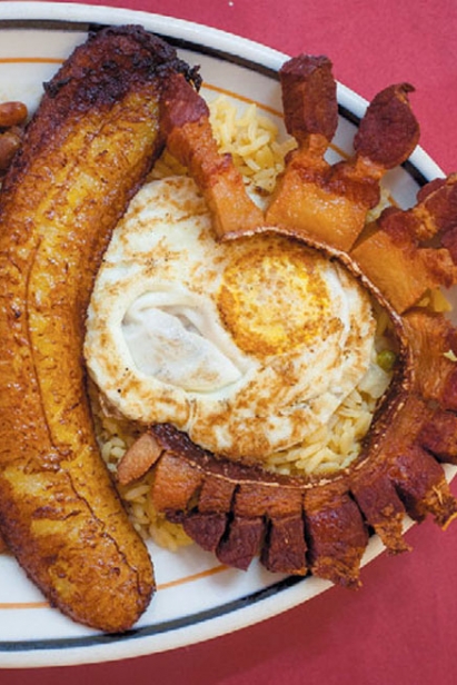Restaurante Montecristo’s traditional fried pork, plantains, egg, rice and red beans