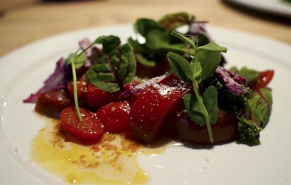 Heirloom Tomato Salad with Gorgonzola, Shaved Cauliflower, Swiss Chard Pesto & Cherry Tomato-Coriander Vinaigrette