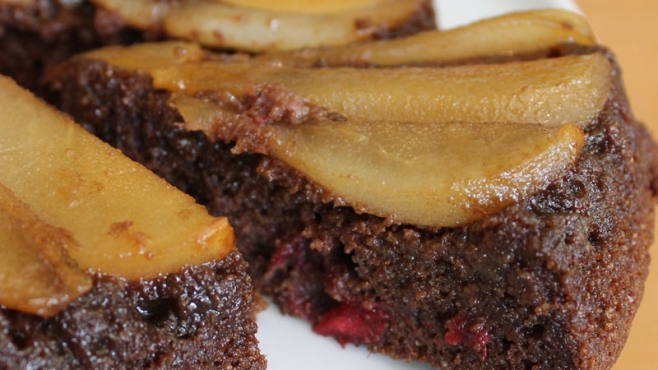 Slice of Chocolate & Pear Upside Down Cake with Fresh Cranberries