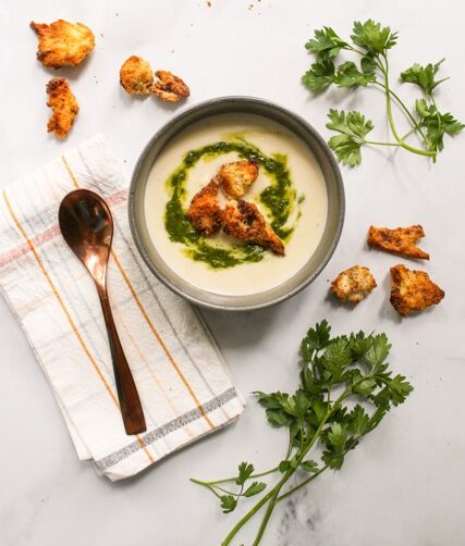 celeriac bisque served in a gray bowl