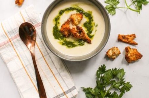 celeriac bisque served in a gray bowl